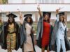 group-young-afro-american-female-student-dressed-black-graduation-gown-campus-as-background-scaled.j.jpeg
