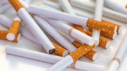 close-stack-cigarettes-on-white-600nw-2512615585.jpg