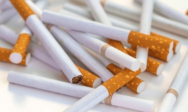 close-stack-cigarettes-on-white-600nw-2512615585.jpg