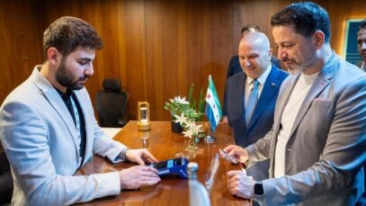 cbs-governor-making-the-first-international-transaction-from-syria.jpg